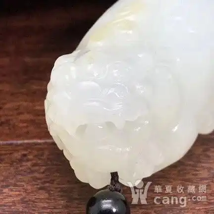 和田玉貔貅把件的寓意招财纳福镇宅辟邪与吉祥如意的综合解析