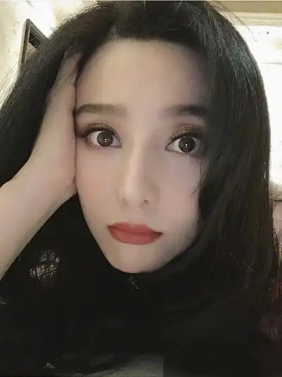 被曝和李晨关系依然友好后,范冰冰晒照笑容甜美,浓密长发惹人羡
