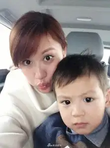 组图田亮儿子小亮仔婴儿照曝光大眼水汪汪皱眉变表情包超可爱