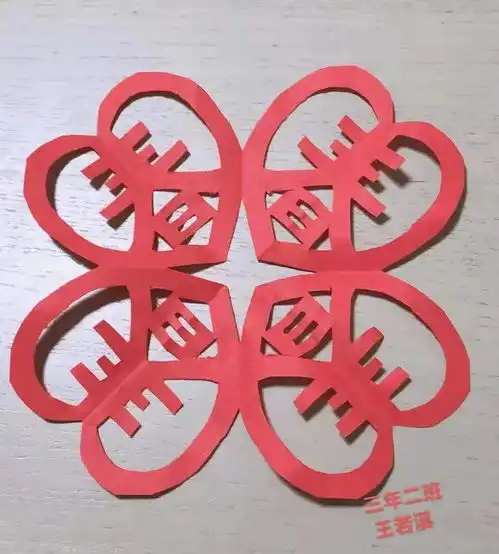 剪窗花,写福字,育才小学传统艺术迎新春